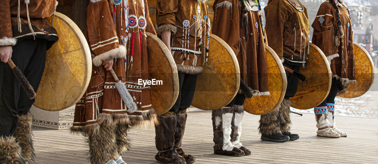 Folk ensemble performance in dress of indigenous people of kamchatka.
