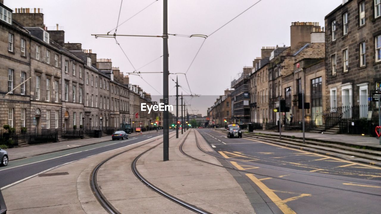 VIEW OF CITY STREET AND BUILDINGS