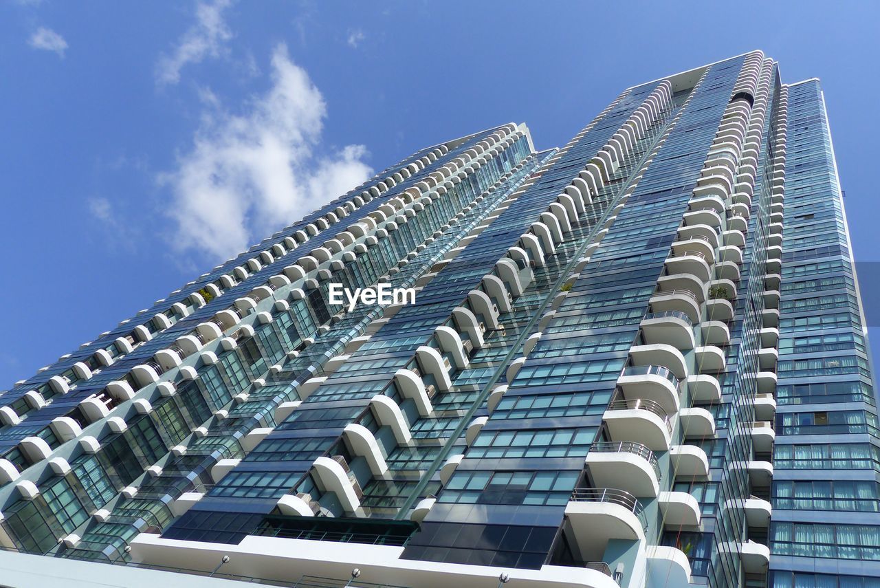 Low angle view of modern building against sky