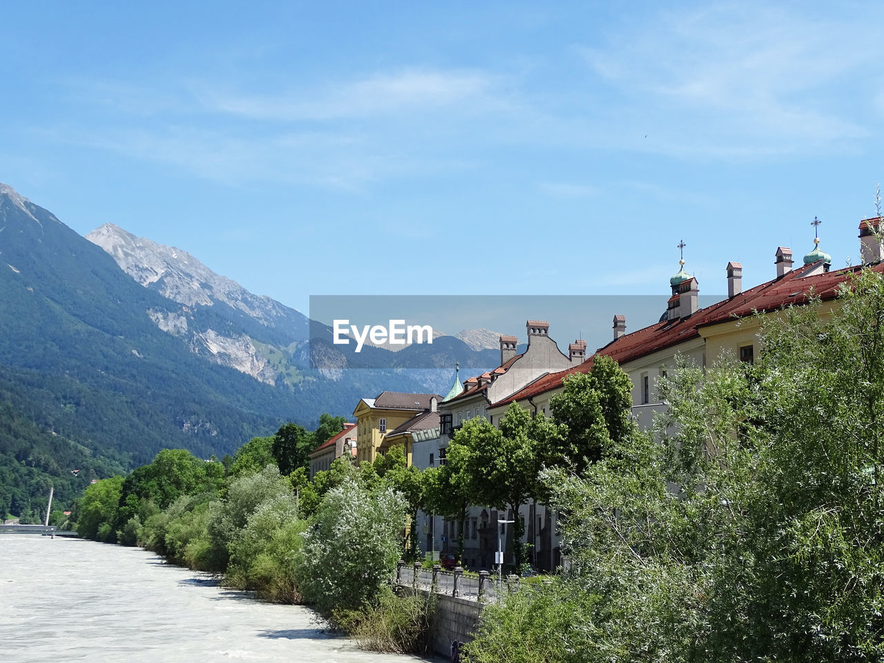 Houses and buildings against sky