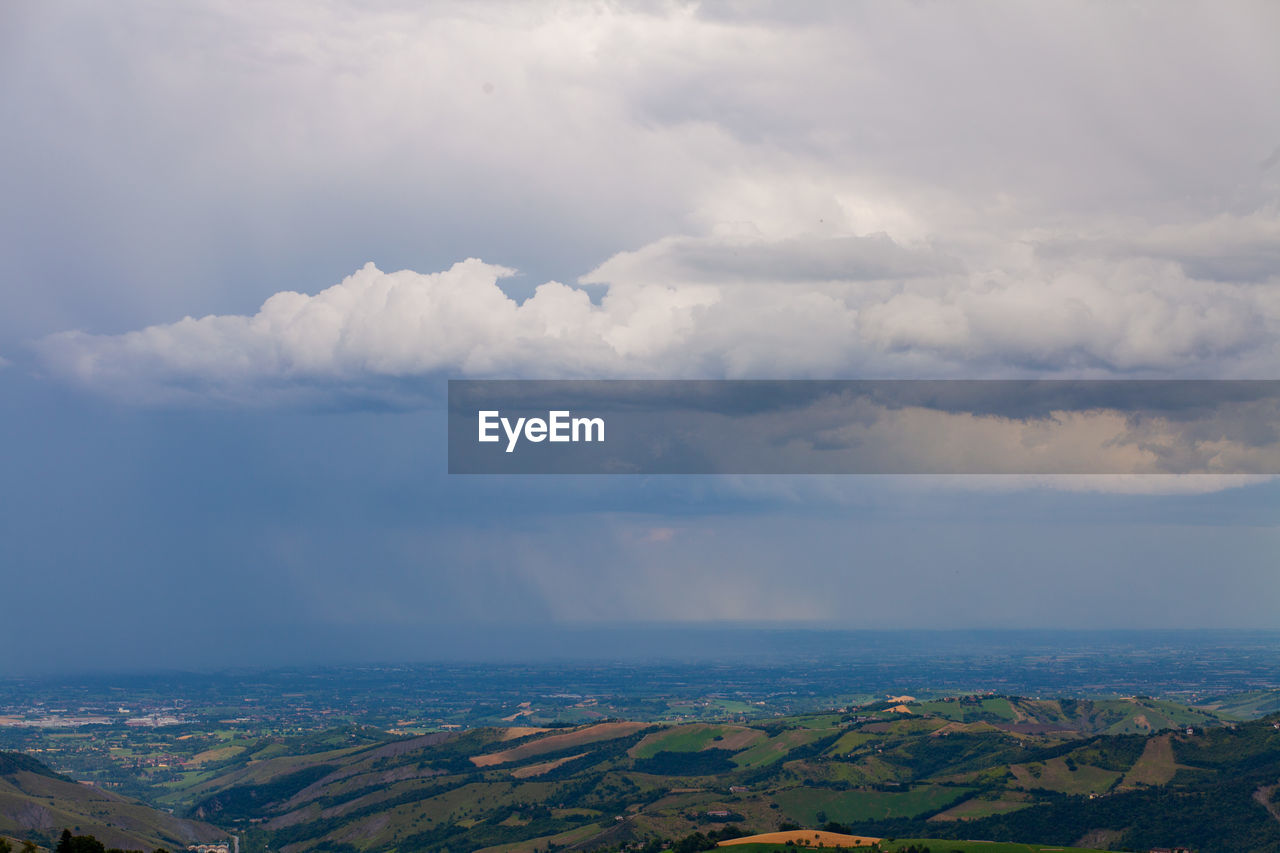 A storm on modena plain seen from little city of serramazzoni on the hills