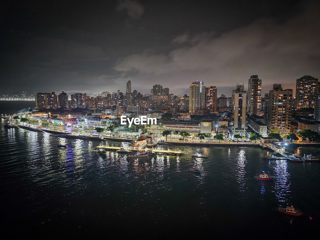 Illuminated buildings in water