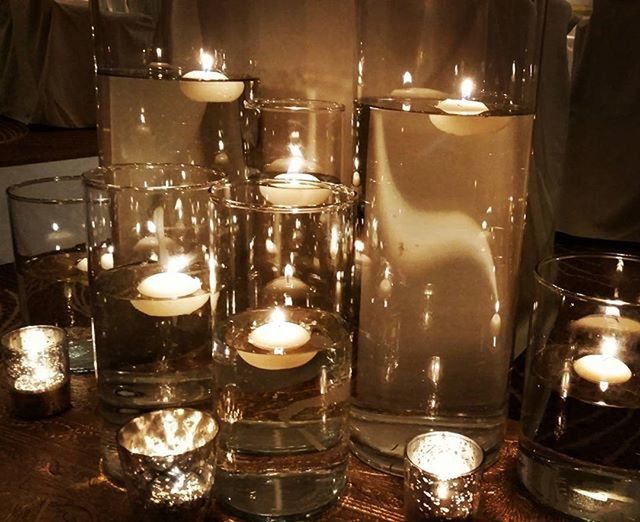 CLOSE-UP OF CANDLE IN RESTAURANT