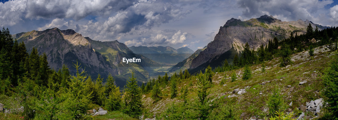 PANORAMIC VIEW OF LANDSCAPE AND MOUNTAIN AGAINST SKY
