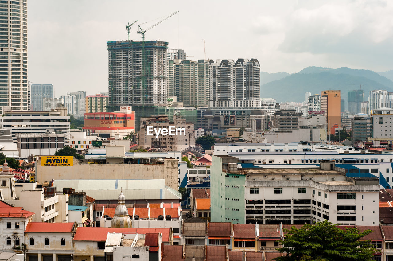 Buildings in penang, malaysia. city against sky.