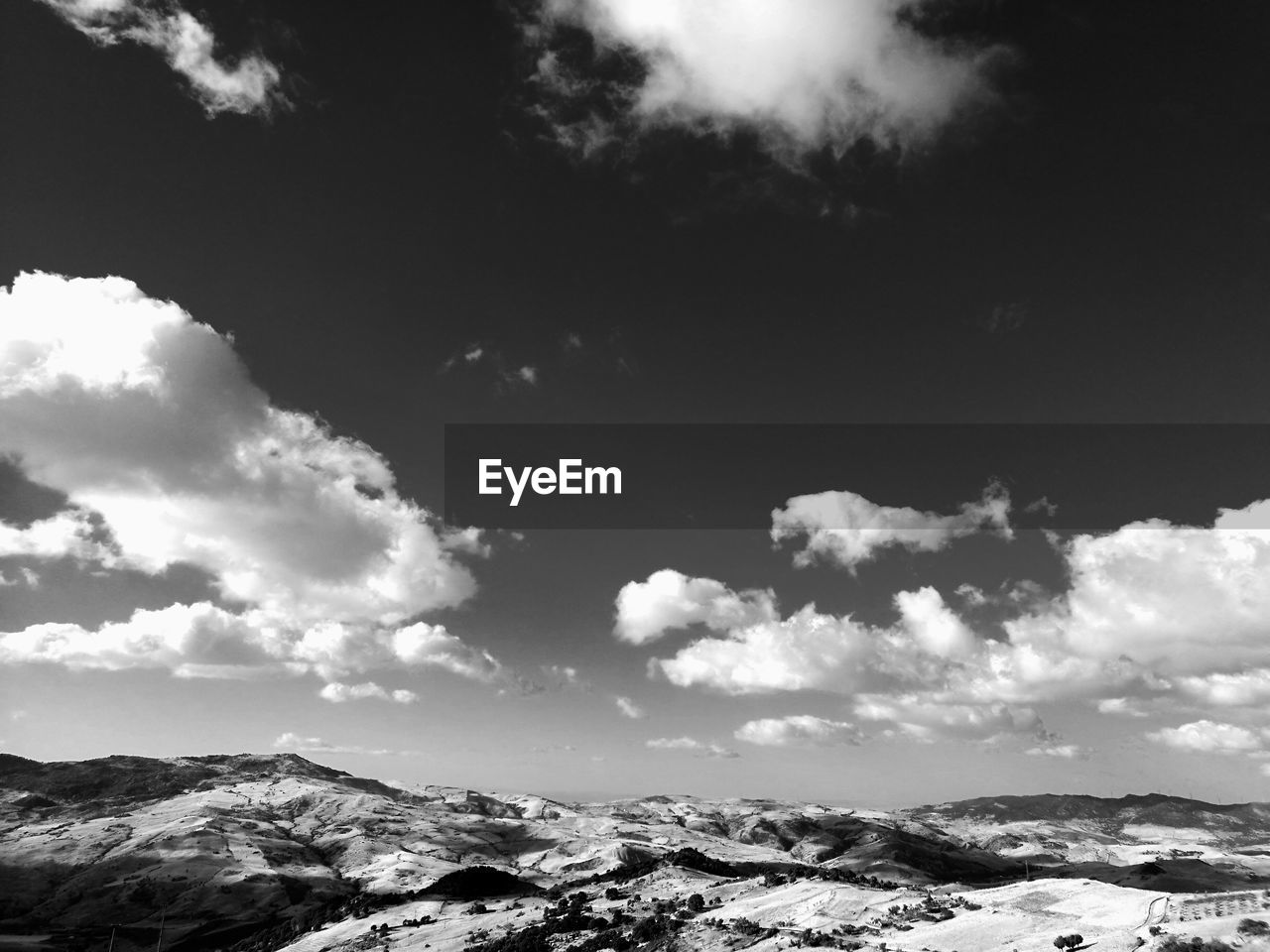 Scenic view of mountains against sky during winter