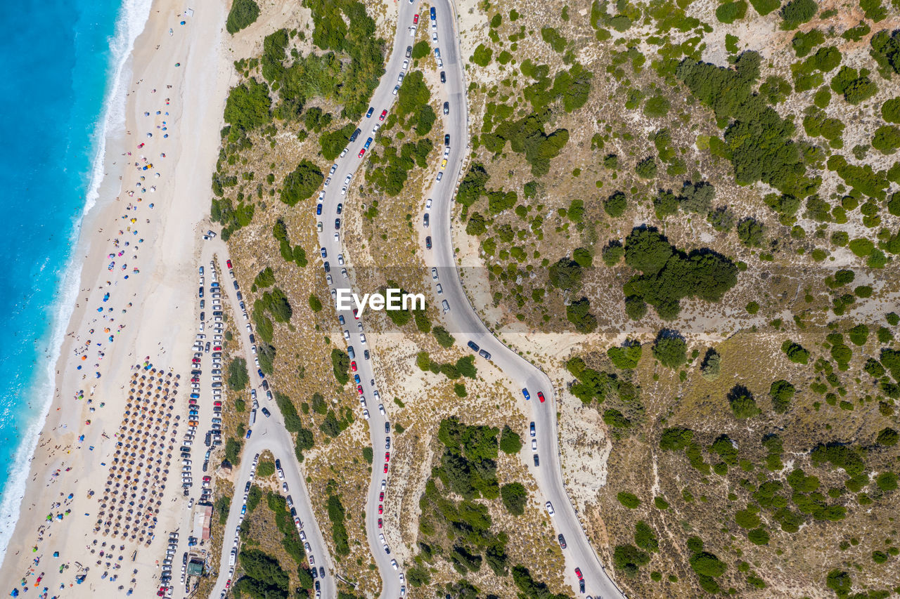 HIGH ANGLE VIEW OF ROAD PASSING THROUGH A LANDSCAPE