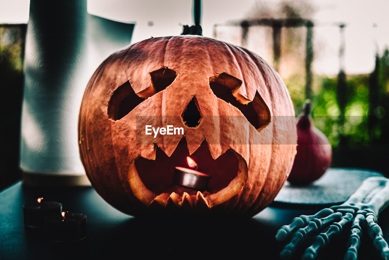 Close-up of jack o lantern on table