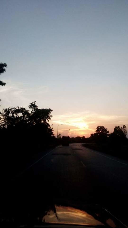 ROAD SEEN THROUGH WINDSHIELD