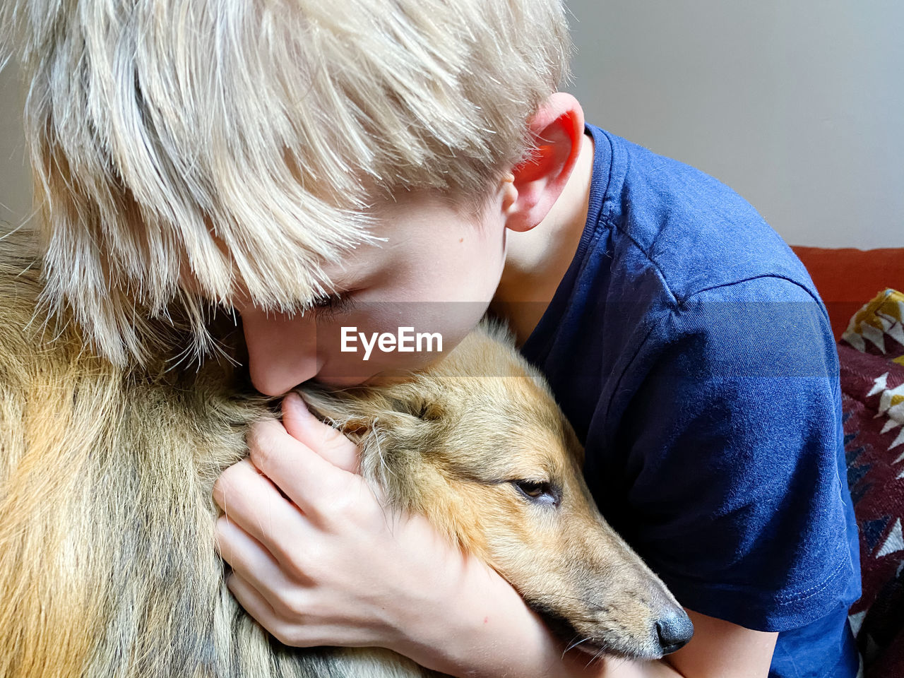 High angle view of boy with dog