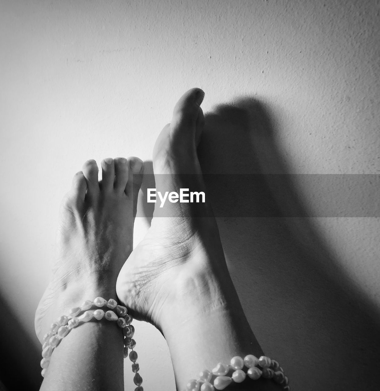 black, white, black and white, close-up, hand, finger, one person, adult, limb, women, indoors, monochrome photography, human leg, monochrome, arm, toe, lifestyles, human limb, low section, bracelet, jewelry, human foot, personal perspective, barefoot, nail polish, nail