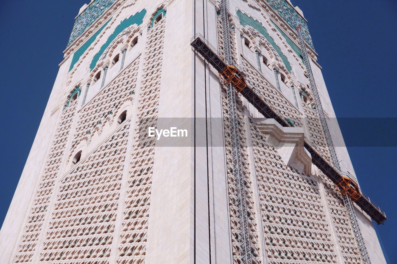 Low angle view of minaret at mosque hassan ii