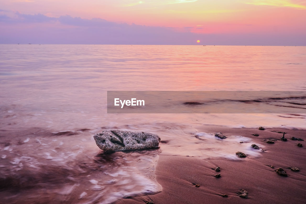 Scenic view of sea during sunset