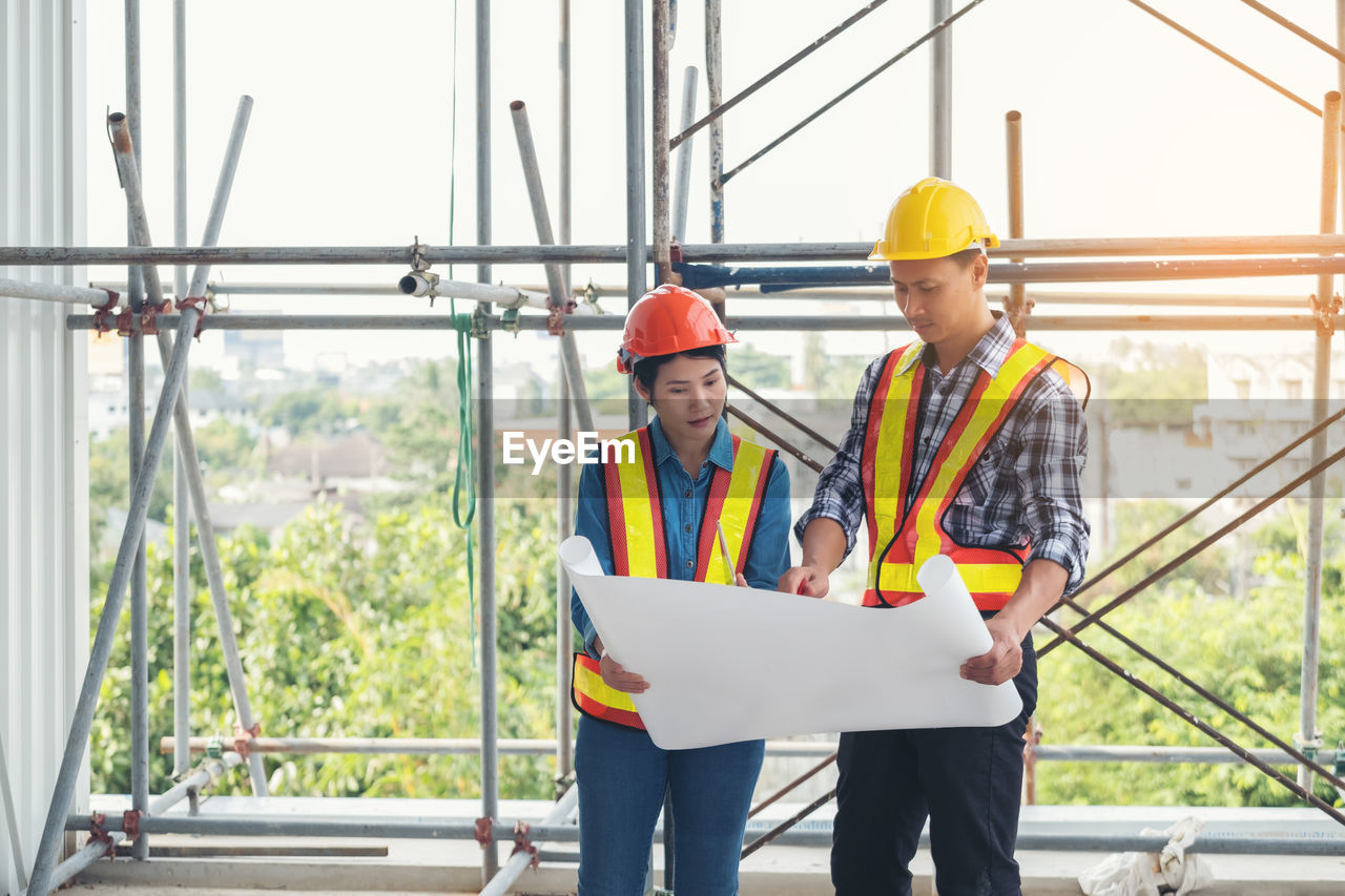 Engineers working at construction site