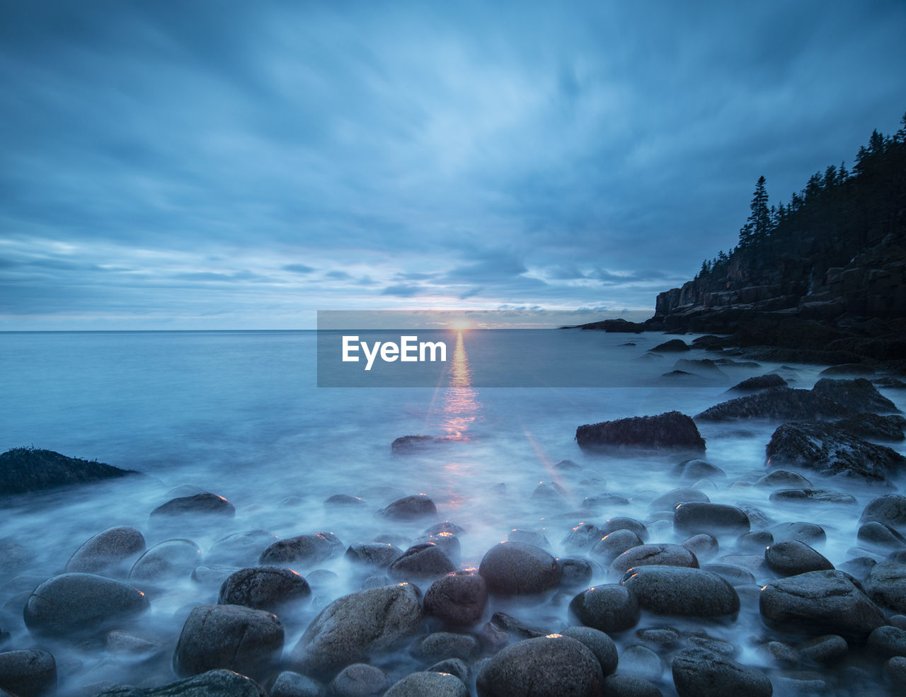 Boulder beach sunrise on rugged maine acadia nat'l park