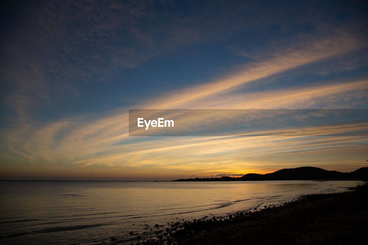 SCENIC VIEW OF SEA AGAINST ROMANTIC SKY