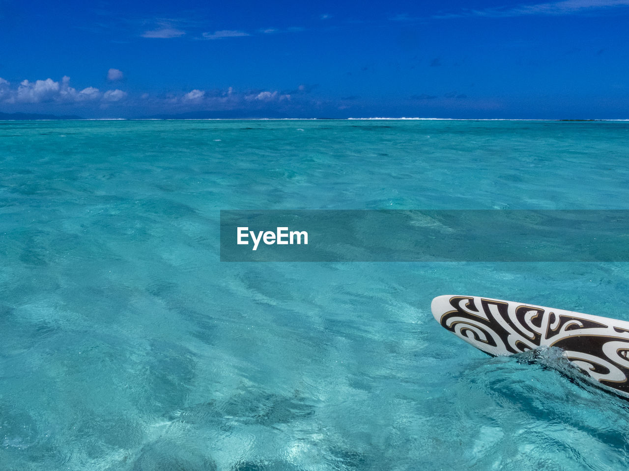 Scenic view of swimming pool by sea against sky