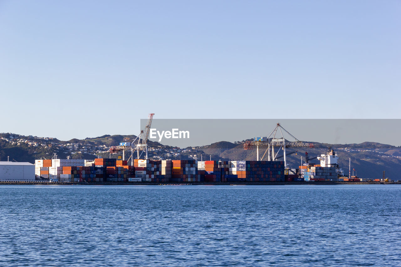 VIEW OF COMMERCIAL DOCK AGAINST SKY