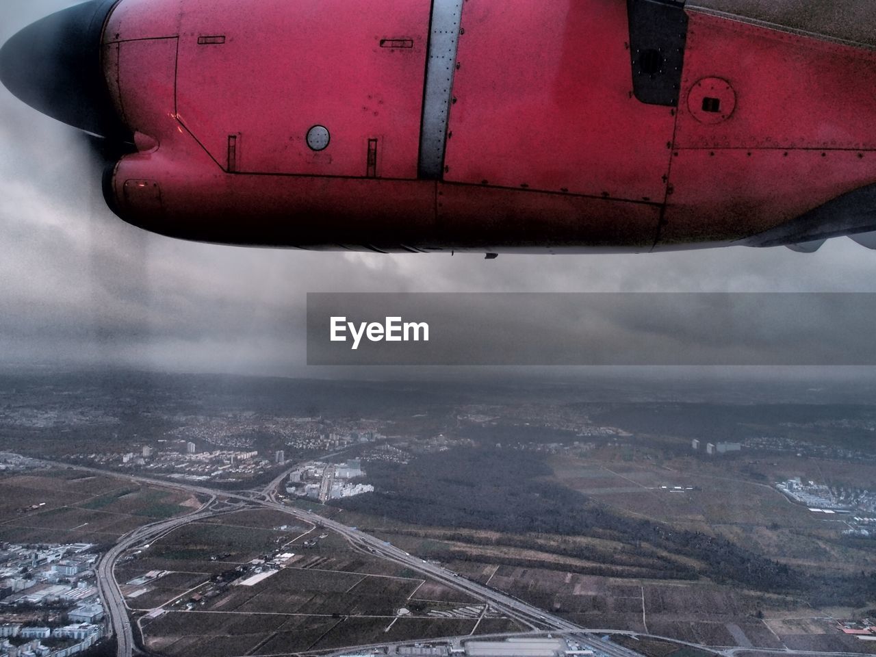 Propeller airplane over land