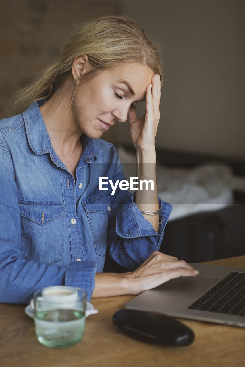 Woman using laptop