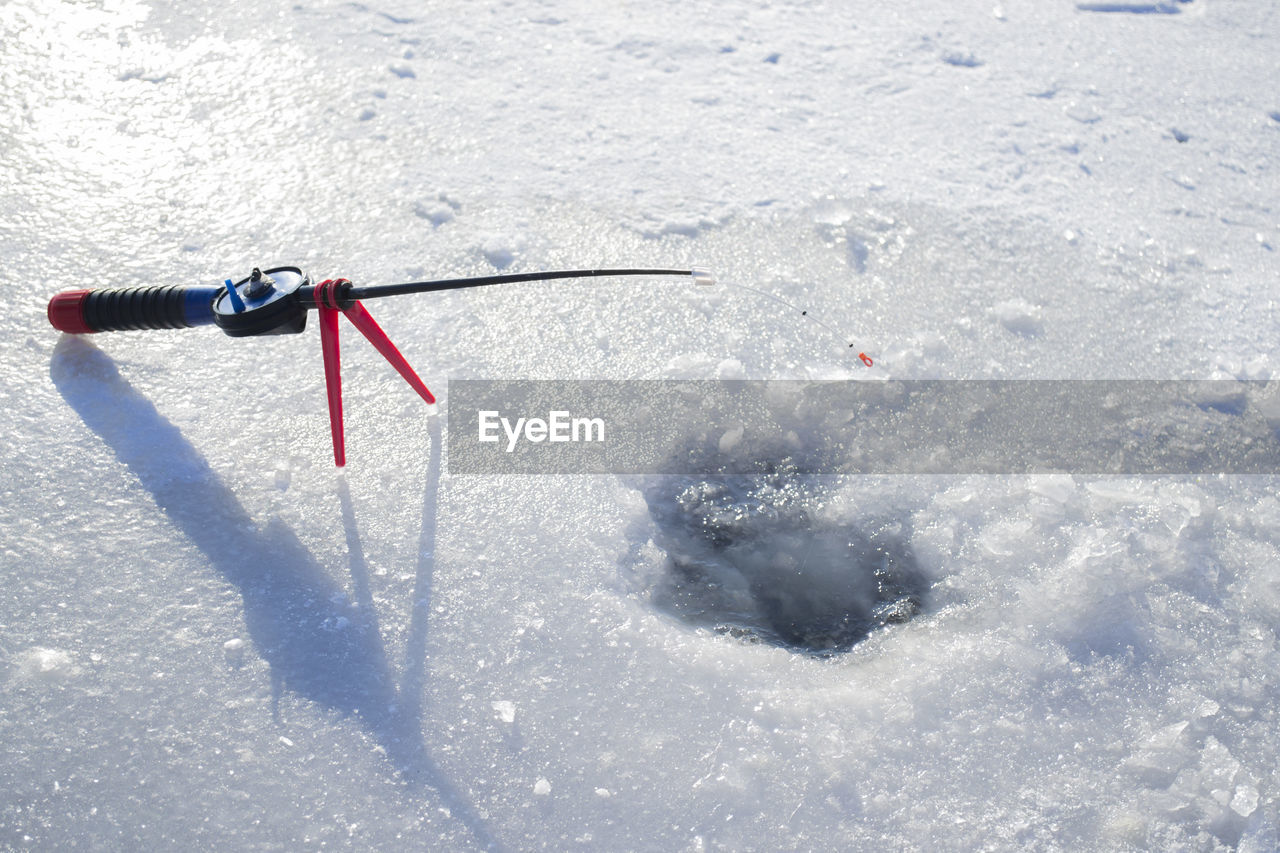 low section of woman skiing on snow