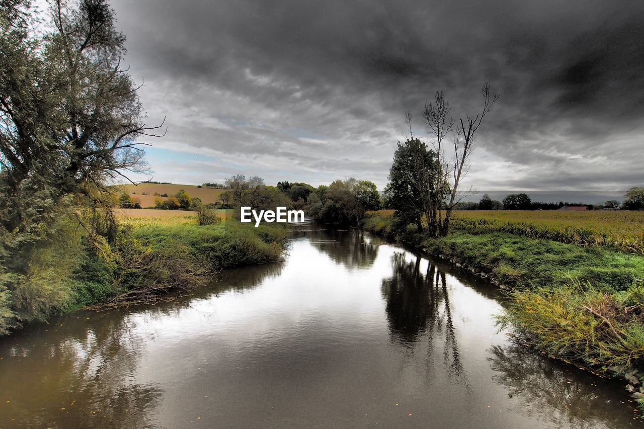 SCENIC VIEW OF RIVER AMIDST LANDSCAPE AGAINST SKY