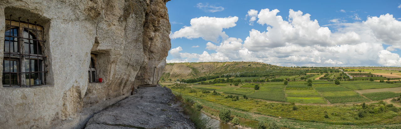 PANORAMIC SHOT OF LAND AGAINST SKY