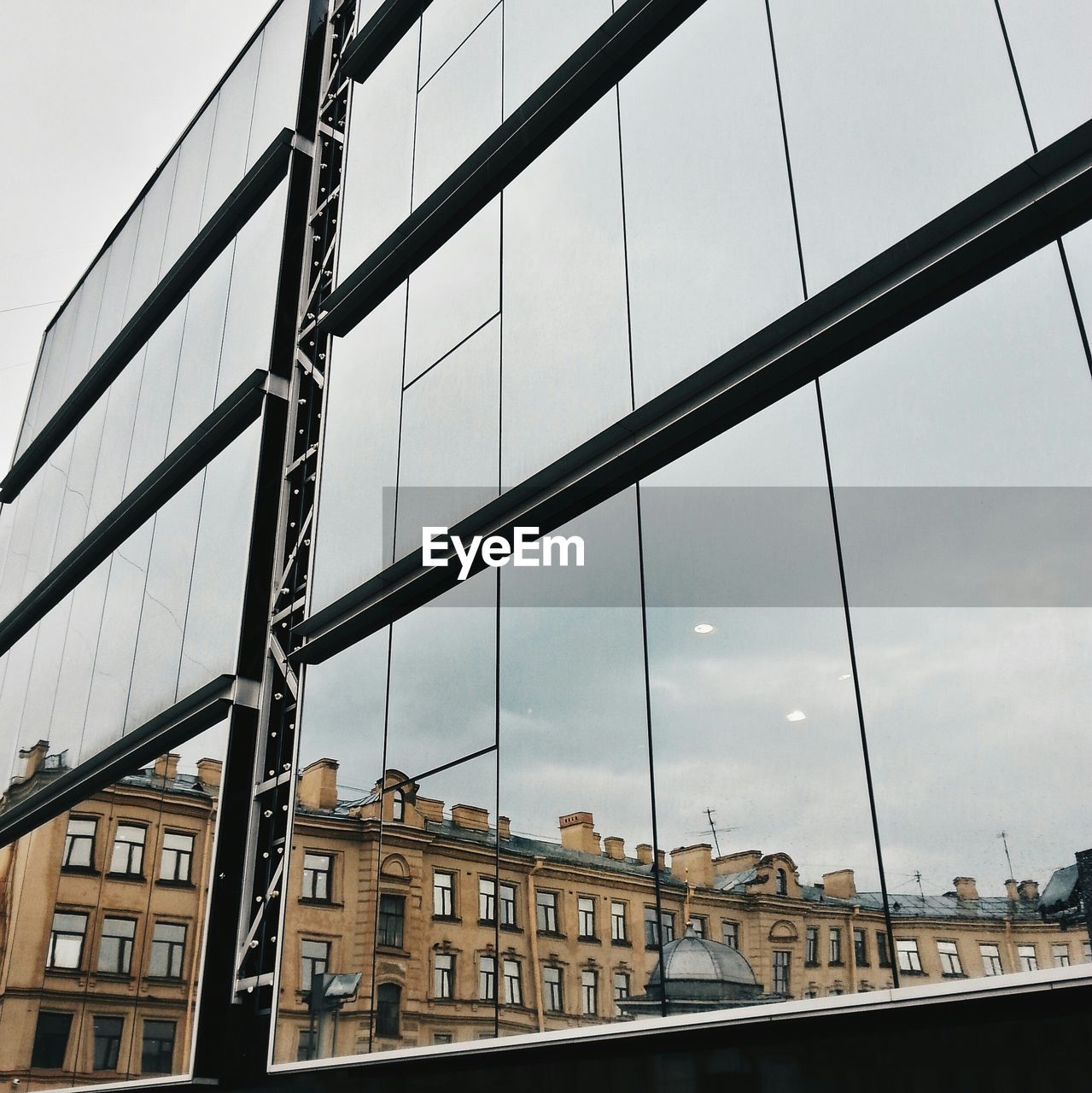 Reflection of buildings on glass