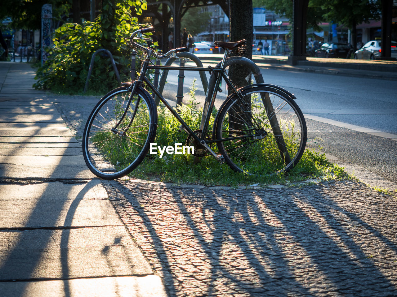 Bicycle parked on street in berlin kreuzberg