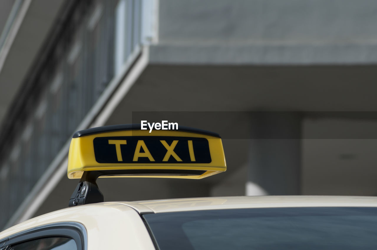 Close-up of text on taxi