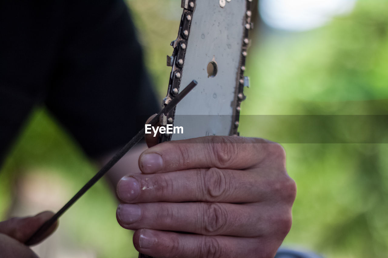 Cropped image of man working outdoors