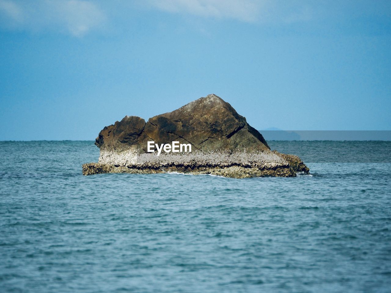 water, sea, ocean, sky, islet, horizon, shore, coast, beauty in nature, scenics - nature, rock, nature, land, island, blue, no people, bay, wave, tranquility, beach, horizon over water, terrain, tranquil scene, travel destinations, outdoors, cliff, day, body of water, travel, idyllic, animal, cloud, non-urban scene, wildlife