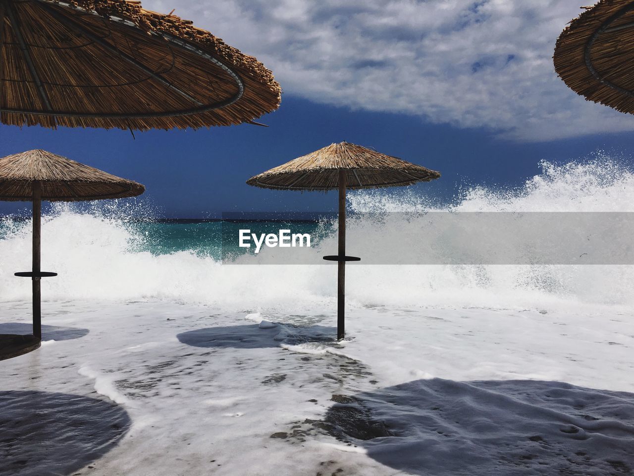 Sea water splashing on beach