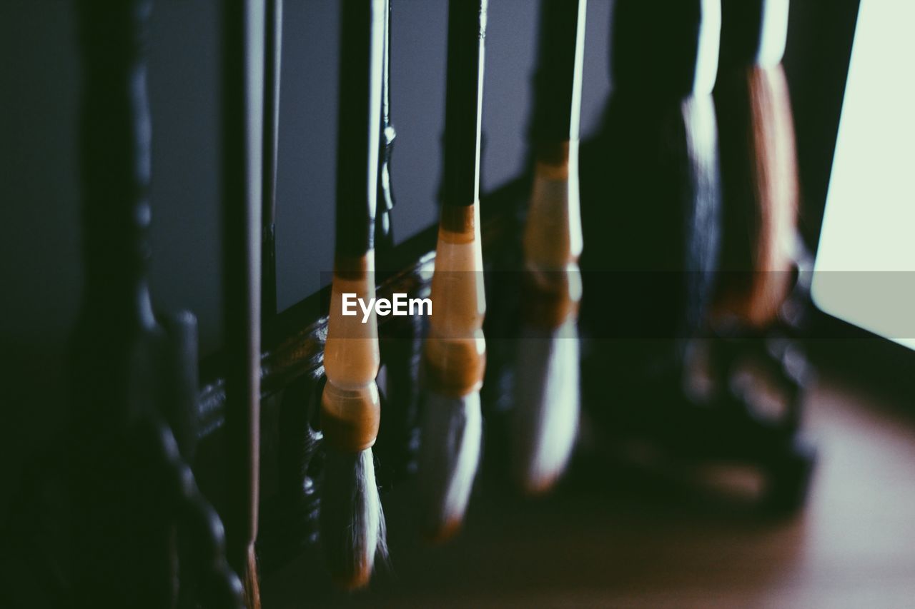 Close-up of paintbrushes at home