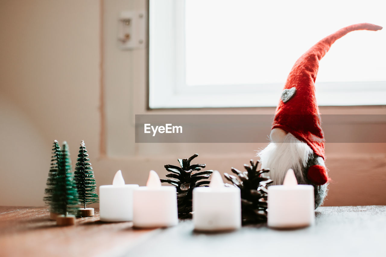 Close-up of christmas ornaments on table