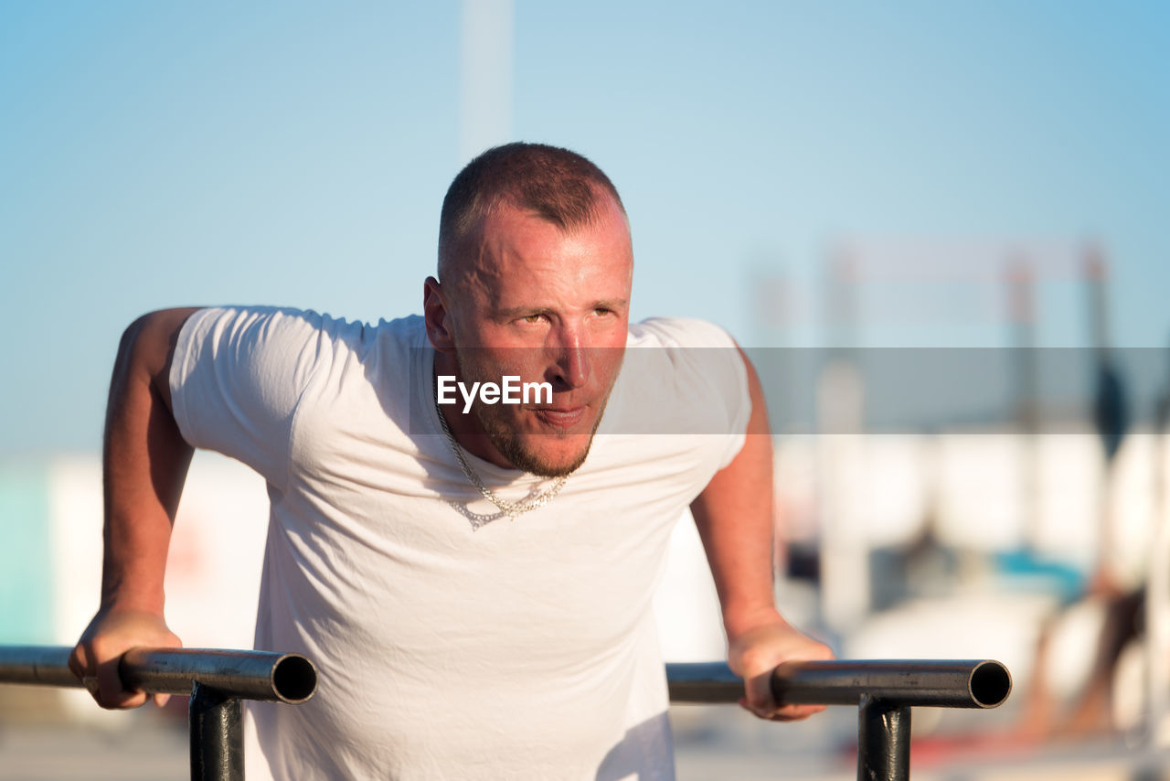 Man exercising at park