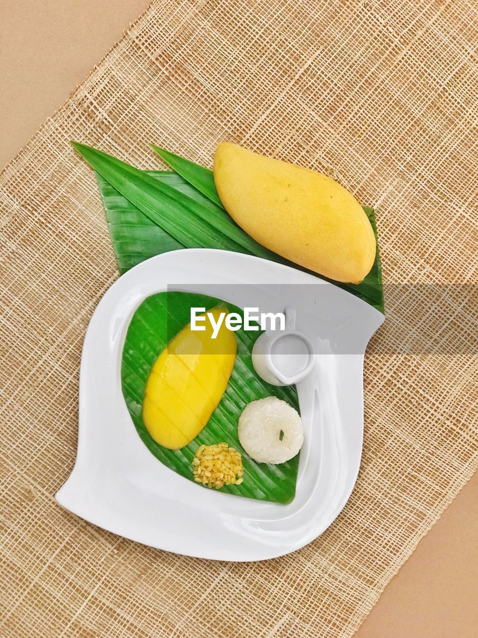Directly above shot of mango in plate on table