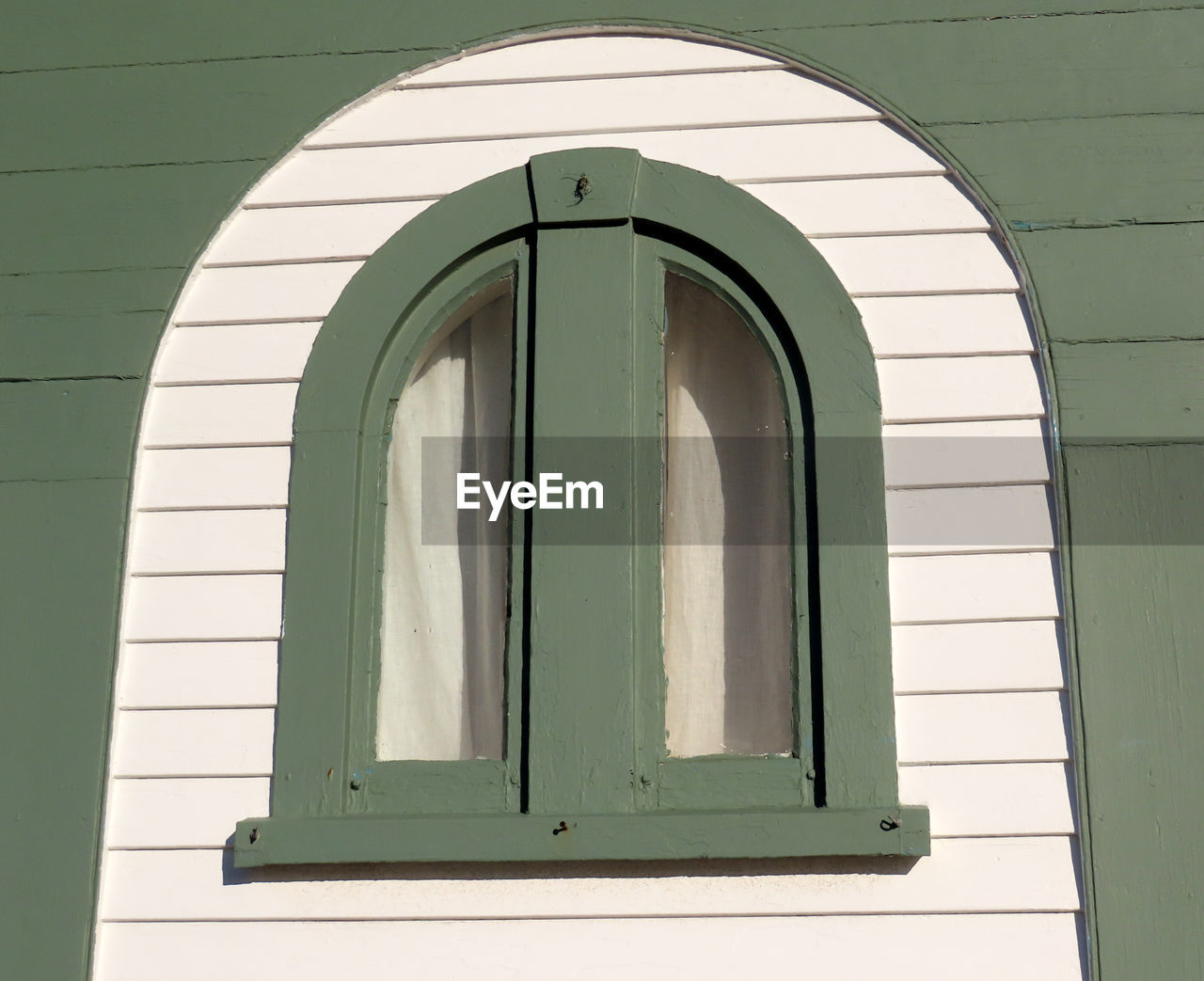 LOW ANGLE VIEW OF WINDOW ON WALL