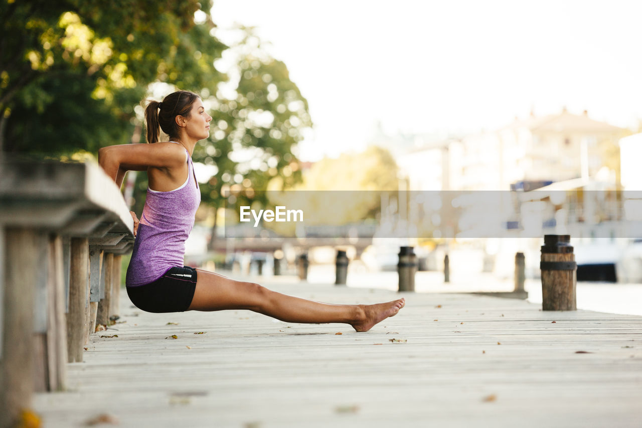 Young woman exercising, uppsala, sweden