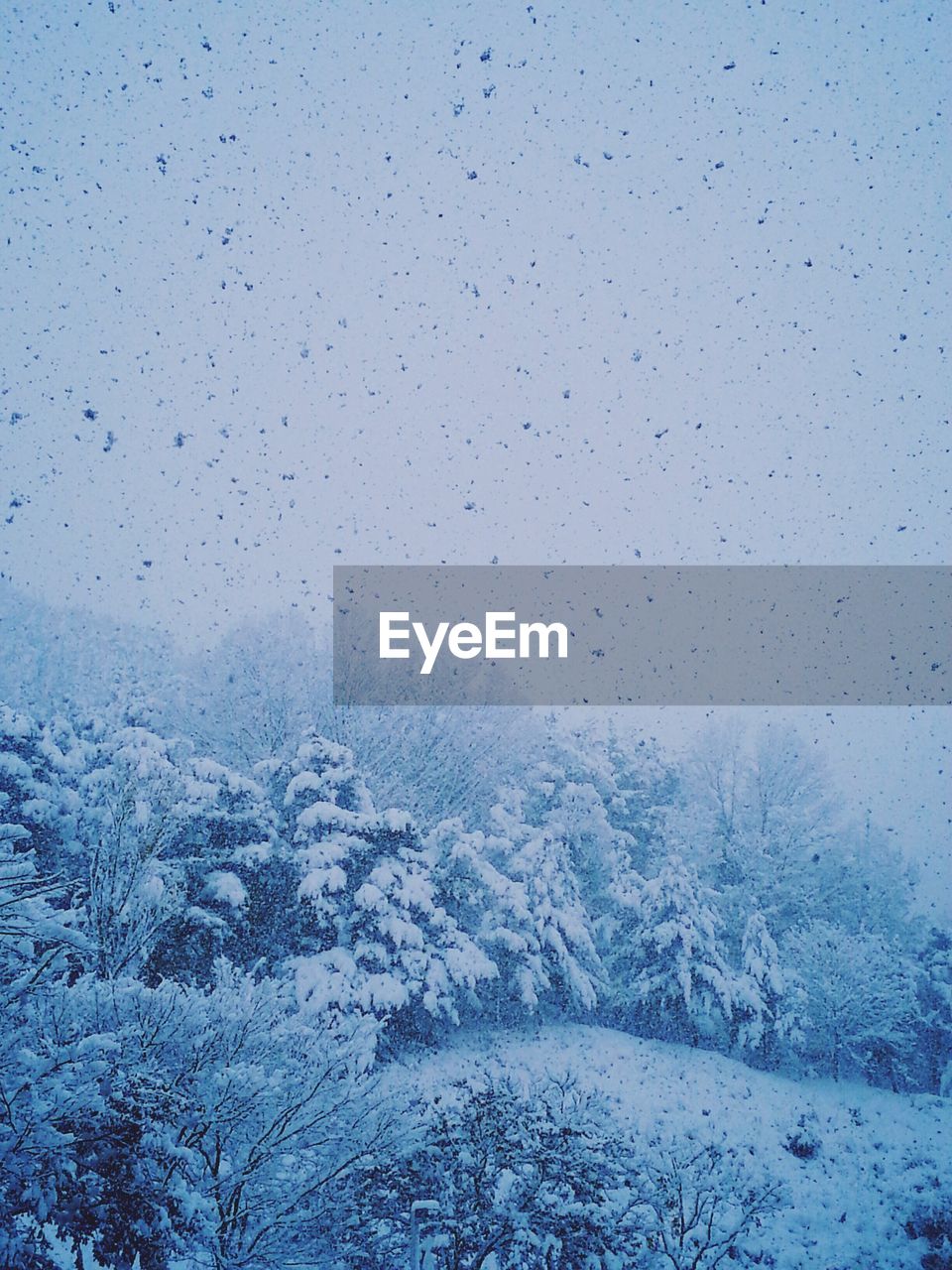 VIEW OF SNOW COVERED MOUNTAIN RANGE