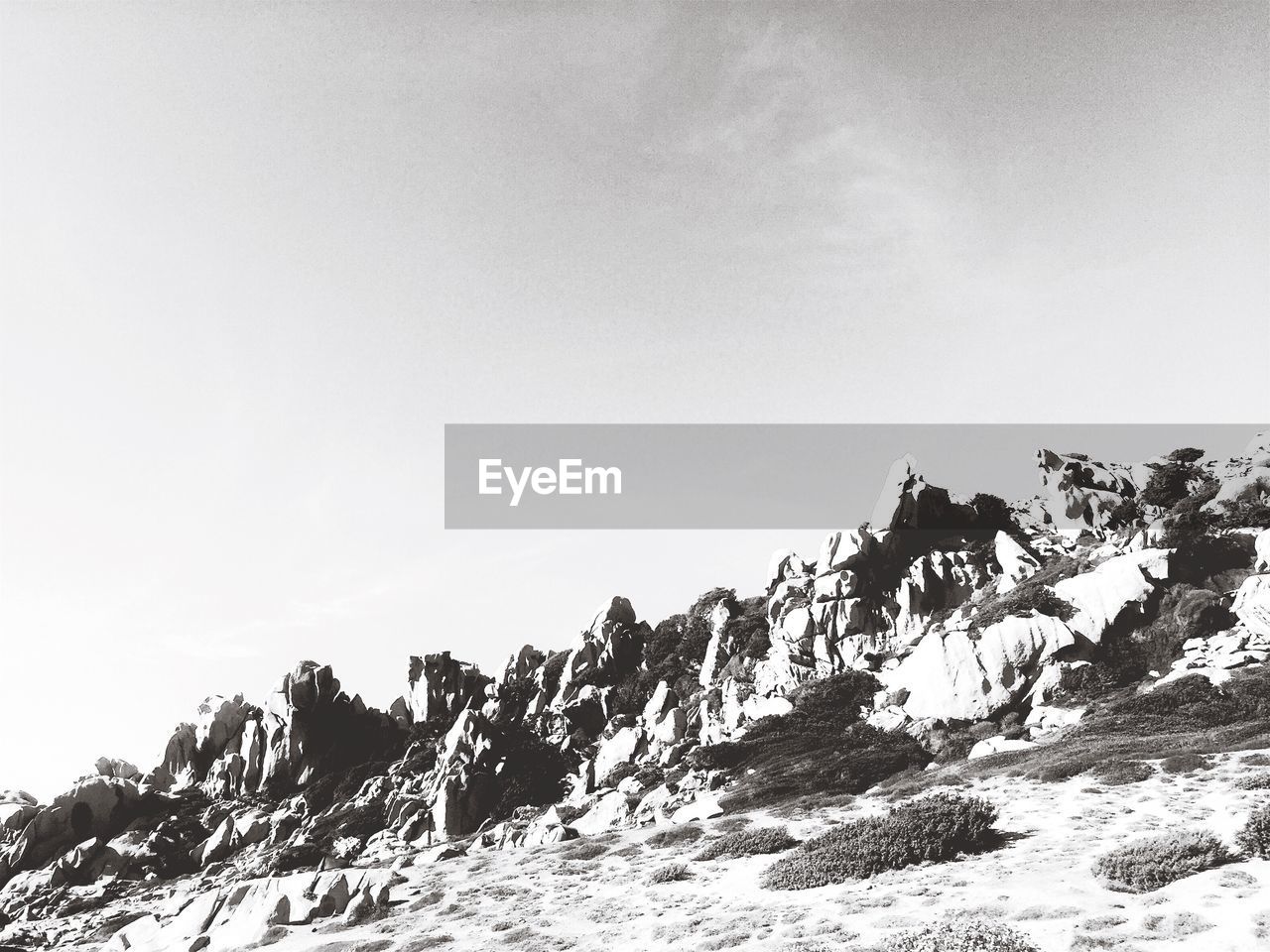 LOW ANGLE VIEW OF MOUNTAIN AGAINST CLEAR SKY