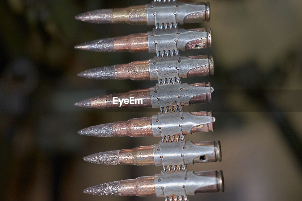 Close-up of bullets against blurred background