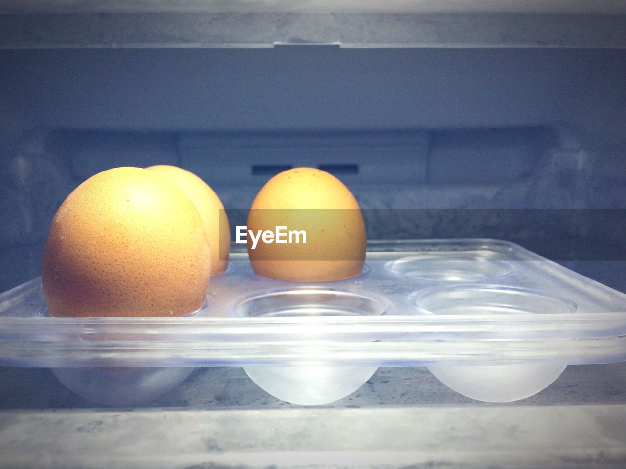 Close-up of eggs in refrigerator