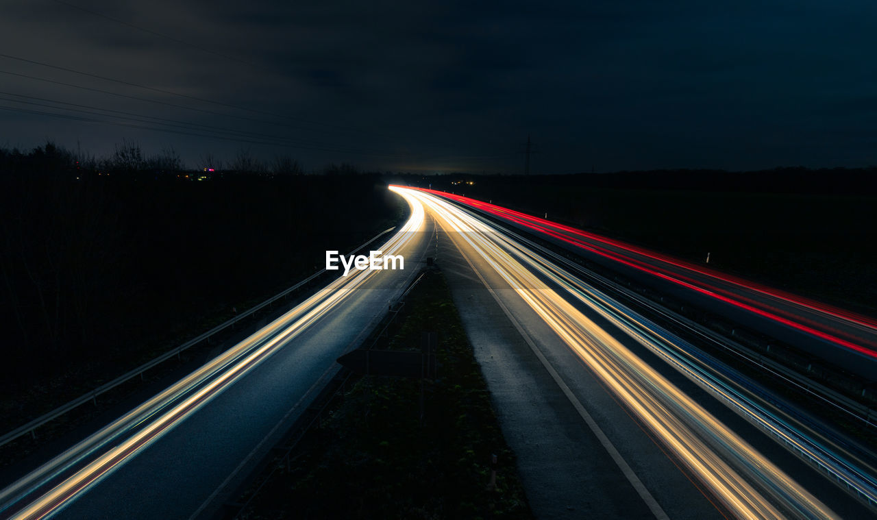 high angle view of light trails on highway