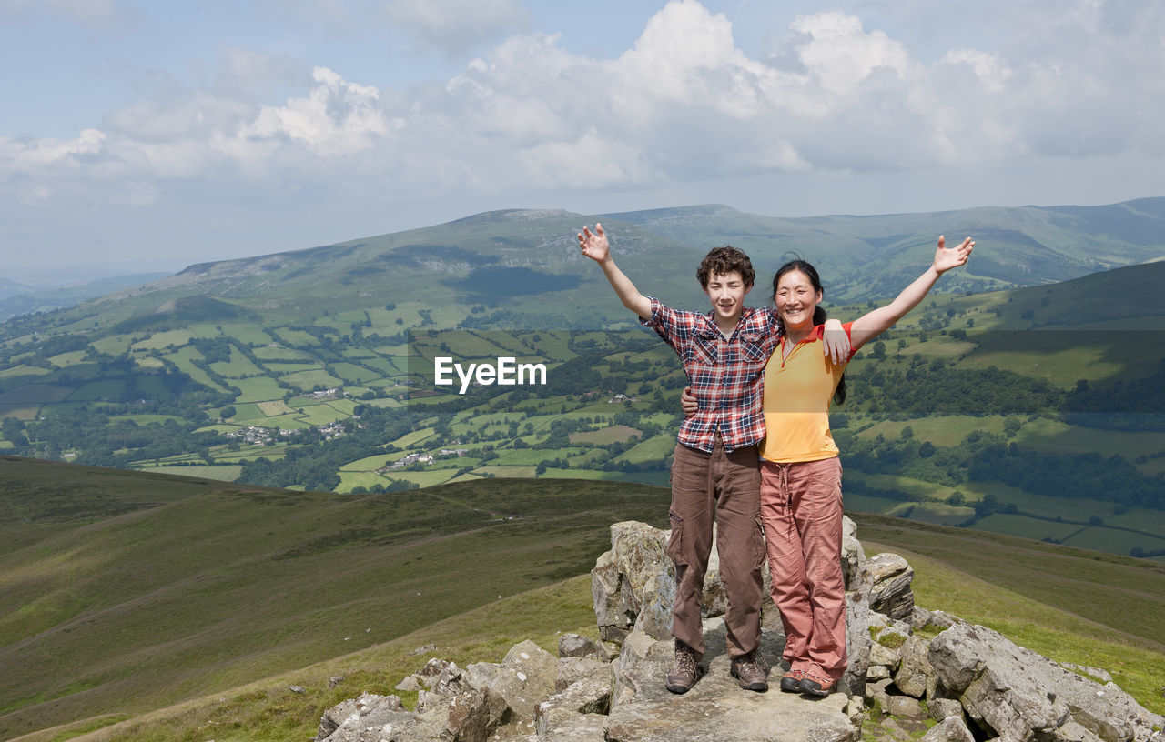 Mother and son on top of hill in south wales