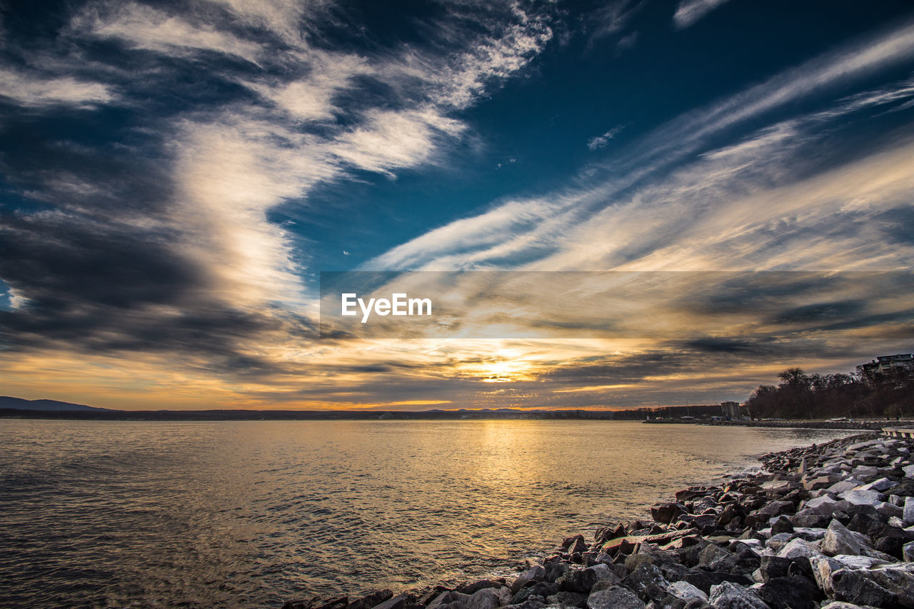 Scenic view of sea against sky during sunset