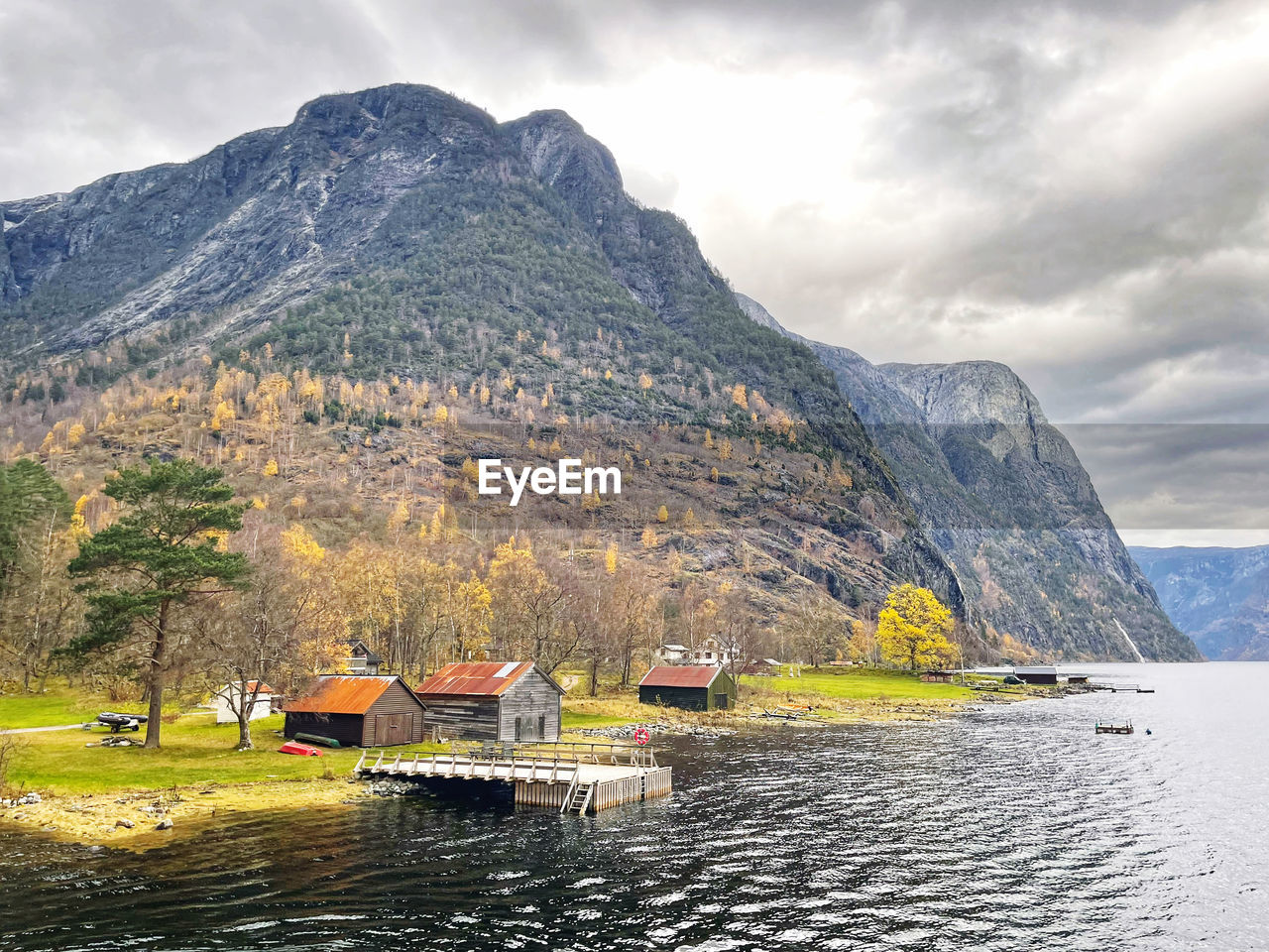 Old wooden houses by the fjord of norway