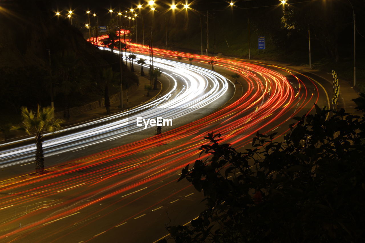 Light trails on road at night