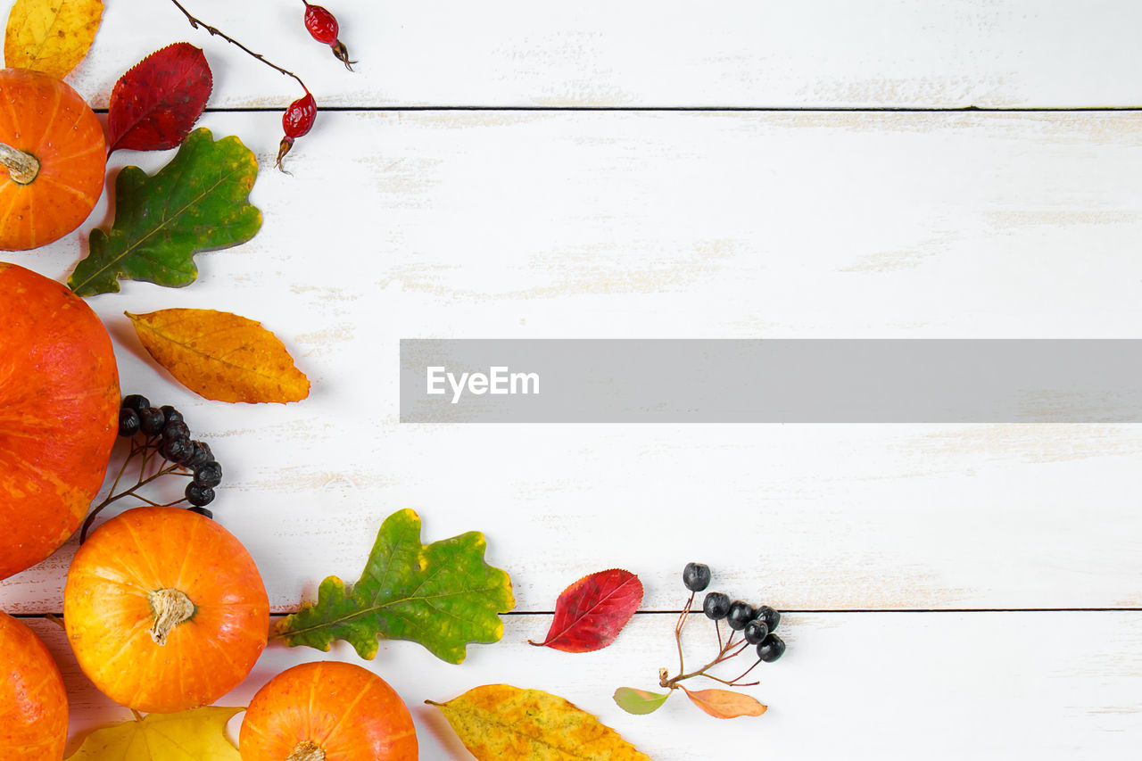 directly above shot of fruits on wooden table