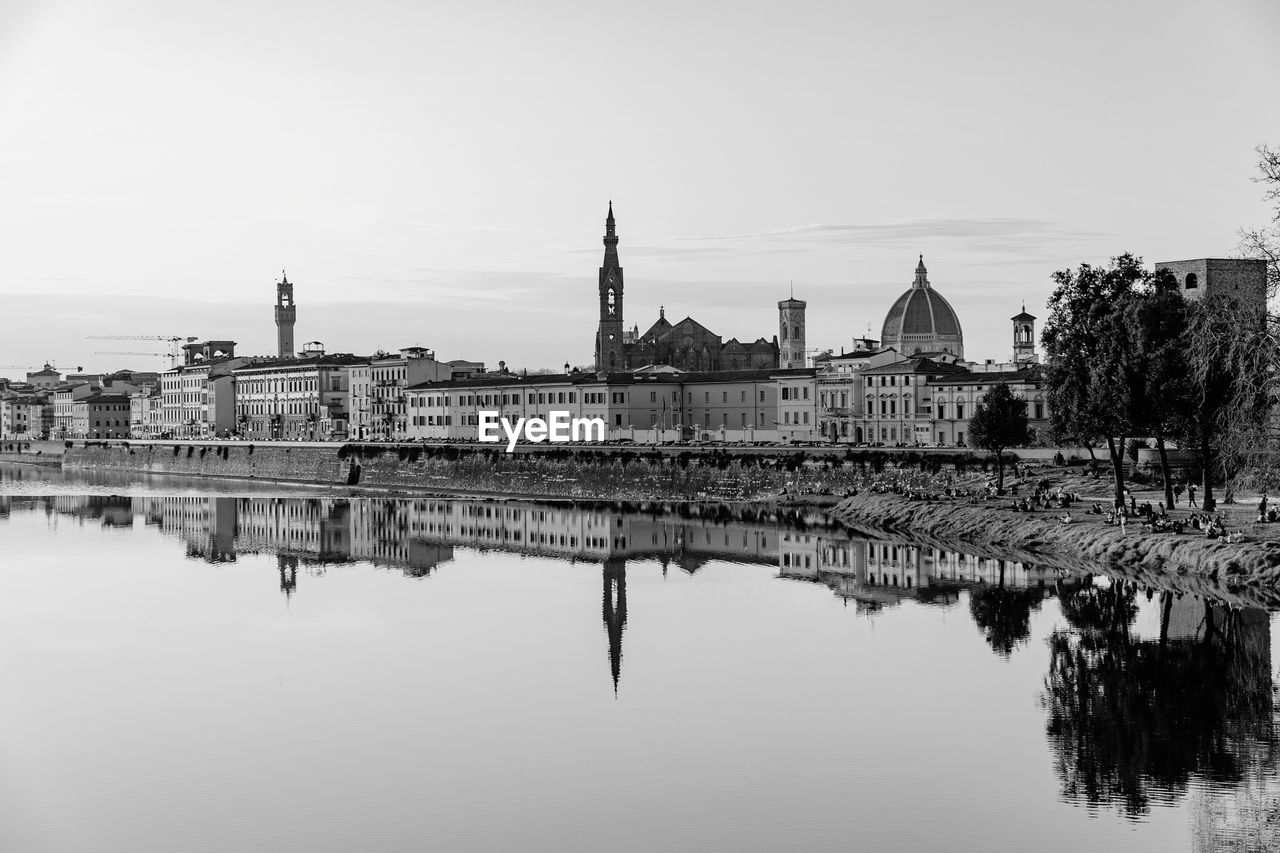 water, architecture, reflection, built structure, building exterior, sky, city, travel destinations, skyline, cityscape, black and white, nature, building, history, monochrome photography, the past, no people, travel, river, monochrome, tourism, place of worship, religion, outdoors, waterfront, tree